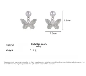 Detailed view of butterfly pearl earrings showing size 1.8cm x 1.6cm and weight 1.7g