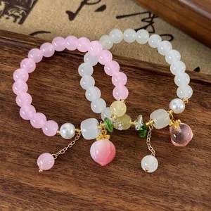Bracelet Perlé avec Pendentif Pêche Künstliche Perles en Verre Künstliche Perles de Culture Roses Blanches Charme Fruit Bracelet Élastique Bijoux Femme
