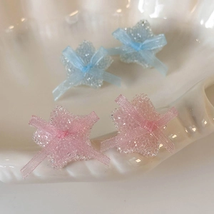 Star-shaped ribbon bow stud earrings in pastel blue and pink resin for women