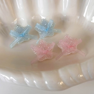 Sweet sugar-coated star earrings with ribbon bows in pastel pink and blue colors