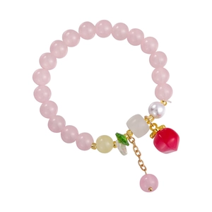 Bracelet en cristal rose avec pendentif pêche et perles douces au design minimaliste chic