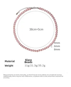 Pink glass bead necklace with silver lobster clasp and adjustable extension chain details
