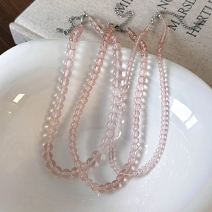 Pink transparent glass beaded necklace with adjustable silver lobster clasp and tail chain