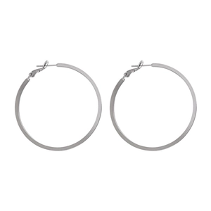 Minimalist silver large hoop earrings with sleek flat design and stud closure for women