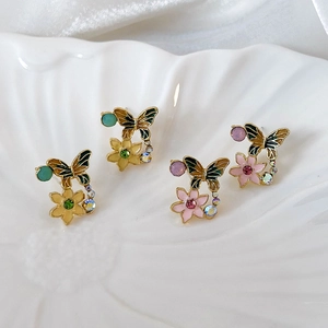 Vintage butterfly and floral enamel stud earrings set in pink and yellow finishes