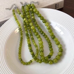 Handmade green natural stone beaded necklaces in various bead sizes with silver clasps