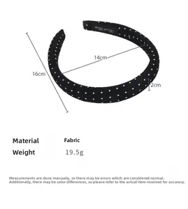 Detailed view of polka dot satin headband with 19.5g weight and dimension specifications