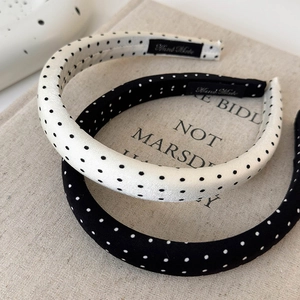 Satin polka dot padded headbands in black and white with vintage handmade label