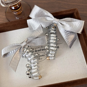 Silver bow hair tie with spiral phone line and metallic beads for high ponytail