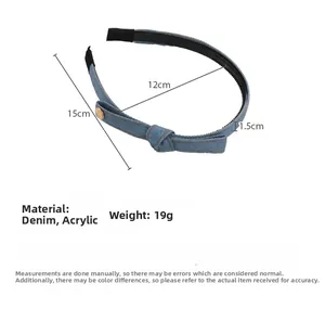 Detailed view of blue denim bow headband showing size 12cm by 15cm with 1.5cm width