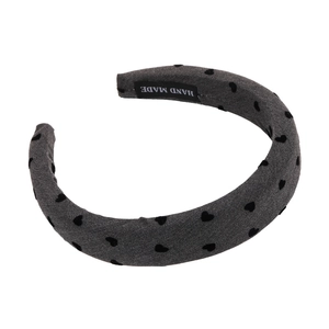Padded grey headband with black heart pattern and handmade label for high skull top look