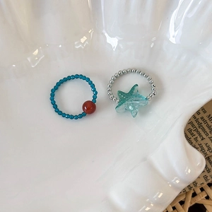 Mint green starfish beaded rings set with turquoise star pendant for summer beach vacation