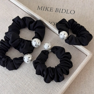 Polka dot cotton pearl hair scrunchies set in black fabric for French retro hairstyles