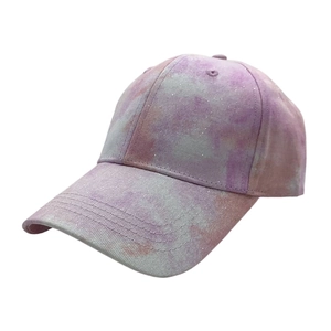 Pink and purple tie-dye baseball cap with glitter sequins and curved brim on white background
