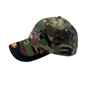 Detail of USA embroidery and flag on camo sun hat with red trim on black brim