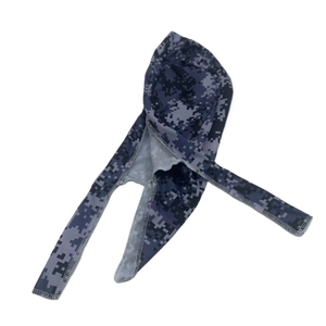 Detail of digital camouflage bandana with grey overlock stitching and tie-back straps