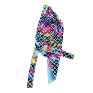 Detail of colorful metallic mermaid scale pirate hat with long ties for outdoor sports