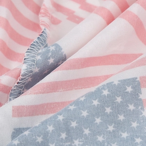 Detailed macro view of US flag bandana showing woven fabric texture and neat overlock stitching