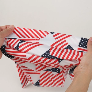 Detail of high-elasticity fabric showing USA flag print and stretch performance