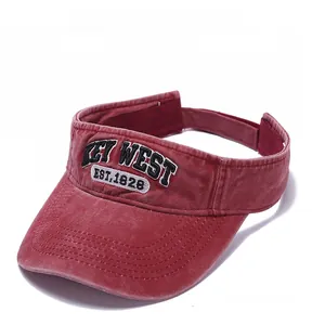Detailed close-up of retro red sun visor with Key West 3D embroidery and washed texture