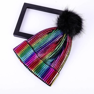 Rainbow metallic knit beanie with black faux fur pom pom for winter fashion