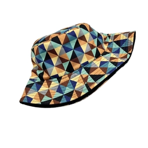Detailed shot of multi-color geometric triangle pattern on a reversible bucket hat brim