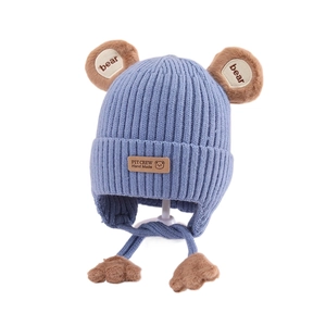 Winter cartoon knit hat for toddlers with cute bear ears and fleece lining in blue color