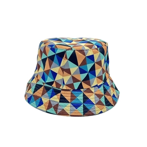 Detail of colorful geometric triangle pattern on a durable cotton bucket hat for summer