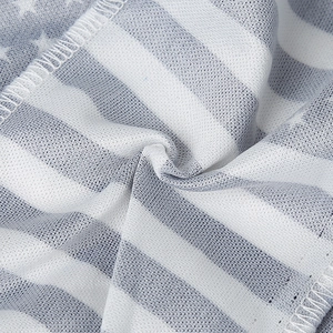 Detailed macro view showing breathable mesh fabric with US flag star pattern and stitching