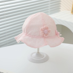 Pale pink baby lace bucket sun hat with floral details and chin ties for summer