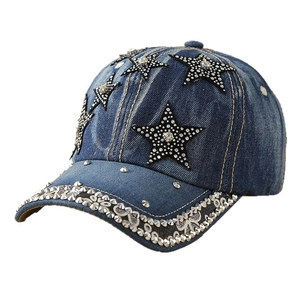 Denim baseball cap with rhinestone stars and silver metal studs in a retro washed style