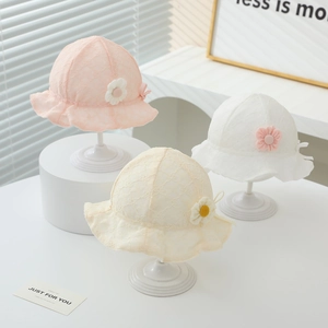 Detailed view of three baby lace sun hats with floral mesh texture and side flower ornaments