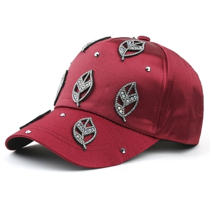 Burgundy satin baseball cap with sparkling silver leaf rhinestones and studded accents