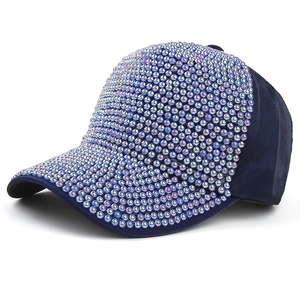 Navy blue baseball cap featuring colorful gradient pearl embellishments and suede fabric