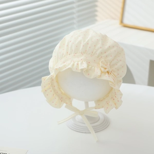 Baby Sonnenhut mit rosa Punkten, eleganter Rüschenkrempe und verstellbarem Bindeband