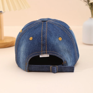 Women's denim baseball cap with contrast stitching and adjustable metal buckle