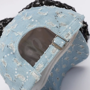 Light blue denim baseball cap with silver sequins and distressed details for women
