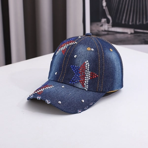 Close-up of denim baseball cap featuring red white blue rhinestones and star patterns