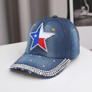 Blue denim baseball cap with rhinestone star patch and sparkling brim details