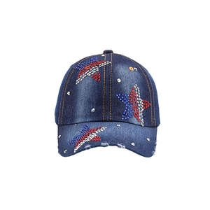 Denim baseball cap with rhinestone stars, silver studs, and distressed frayed brim design