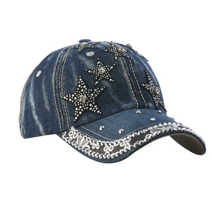 Close-up of denim baseball cap with rhinestone star patches and studded brim detail