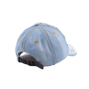 Rear view of light blue denim baseball cap with silver sequins and adjustable leather strap