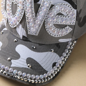 Grey camouflage baseball cap with LOVE crystal and pearl embellishments on front