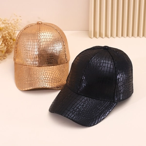 Fashionable faux leather baseball caps with embossed crocodile texture in gold and black