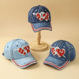 Fashionable denim baseball cap with crystal heart pattern and pearl stud accents