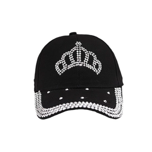Fashionable black baseball cap featuring a rhinestone crown and crystal-embellished brim