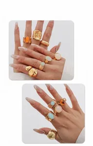 Detailed close-up of vintage acrylic alloy rings with embossed textures and colorful gems