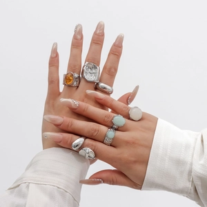 Irregular silver alloy rings set with amber and green stones for women