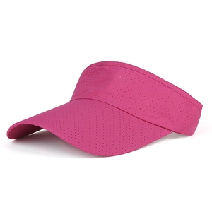 Close-up of rose red sun visor featuring breathable quick-dry fabric with micro-pores