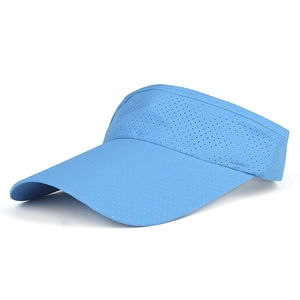 Detail of light blue sun visor with breathable mesh fabric and long curved brim